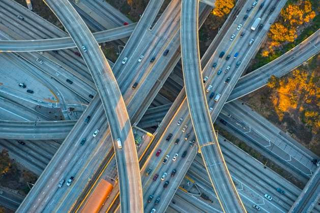 Aerial view of highway interchange in cityscape Los Angeles, California, USA, 21.12.2023, TTBB_BLD222760.jpg, aerial view, backgrounds, california, car, cityscape, color image, commuting, confusion, congestion, day, directly above, distant, driving, freeway, high angle view, highway, horizontal, infrastructure, interchange, intertwined, large group of objects, los angeles, modern, nobody, on the move, outdoors, overpass, photography, spaghetti junction, the way forward, traffic, transportation, travel, united states, urban, vehicle, droneaerial, america, american, americas, auto, automobile, birds eye view, birds-eye view, ca, carriageway, city, color, colour, contemporary, current, daylight, daytime, distance, driver, flyover, from above, Copyright: xChrisxSattlbergerx
