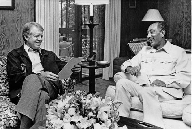 Egypt - Israel Summit at Camp David United States President Jimmy Carter, left, and President Anwar al-Sadat of Egypt, right, meet in Dogwood Lodge at Camp David, the presidential retreat near Thurmont, Maryland on September 19, 1978..Credit: White House via CNP Thurmont Maryland United States of America EDITORIAL USE ONLY Copyright: xx WhitexHousex cnpphotos030746