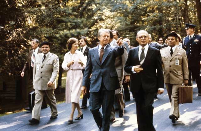 Egypt - Israel Summit at Camp David United States President Jimmy Carter and Prime Minister Menachem Begin of Israel stroll along the paths of Camp David upon Begin s arrival for the Mid-East Summit at Camp David, the presidential retreat near Thurmont, Maryland prior to their meeting on September 6, 1978..Credit: White House via CNP Thurmont Maryland United States of America EDITORIAL USE ONLY Copyright: xx WhitexHousex cnpphotos030785