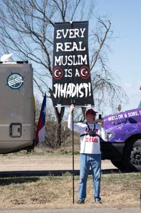 February 3, 2024, Quemado, Texas, U.S: The Religious Zealot group across the street blasting scriptures at the convoy members during US-Mexico Border Security In Texas near Eagle Pass. Quemado U.S - ZUMAm147 20240203_zap_m147_018 Copyright: xHossxMcBainx