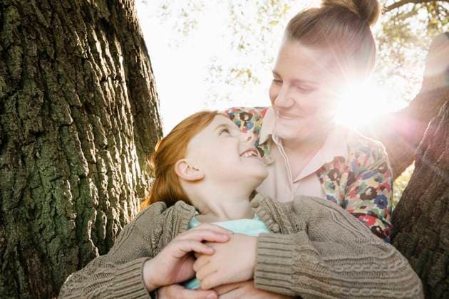 Portrait of mid adult mother and daughter in park Ustka, Pomerania, Poland, 20.12.2023, model released, TTBB_ti00580_00186.jpg, wearing, front view, lens flare, bonding, carefree, cute, innocence, nurturing, sharing, togetherness, unity, affection, happiness, love, relaxation, 30 to 34 years, child, caucasian ethnicity, female, girl, woman, mid adult woman, two people, outdoors, park, day, casual clothing, hugging, smiling, daughter, mother, single parent, lifestyle, sunlight, leisure, family life, 6 to 7 years, enjoyment, only female Copyright: xRobertoxWestbrookx