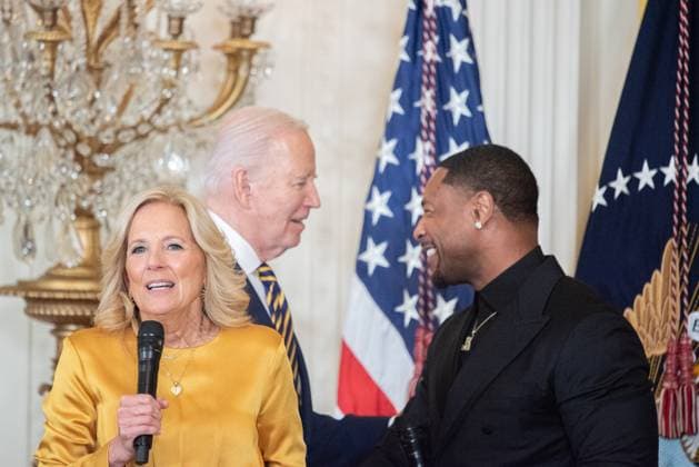Durrell Tank Babbs meets with United States President Joe Biden as First Lady Dr. Jill Biden speaks after Tank s performance at the Black History Month Reception at the White House in Washington, DC on Tuesday, February 6, 2024.  WAX2240206217 AnnabellexGordon