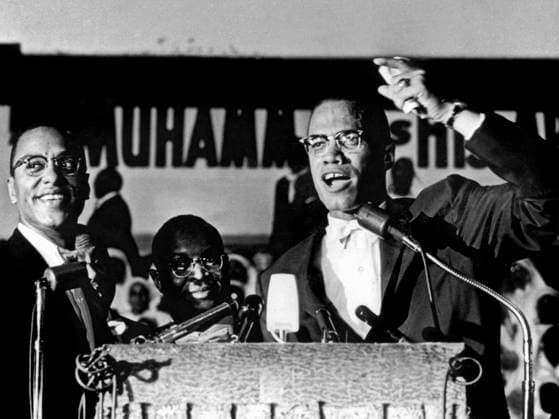 Malcolm X speech at a rally of Nation of Islam at Uline Arena, Washington, 1963 (b w photo) 1699641 Malcolm X speech at a rally of Nation of Islam at Uline Arena, Washington, 1963 (b w photo) by Saunders, Richard (1922 1987); (add.info.: Malcolm X (1925-1965) during a speech at a rally of Black Muslims at U-line Arena, Washington, june 25, 1961, photo by Richard Saunders). Copyright: xBridgemanxImagesx 1699641