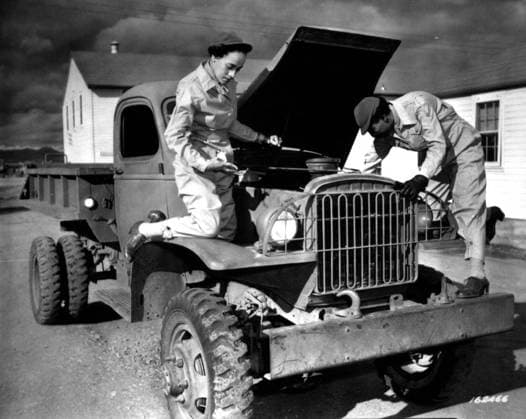 African-American Auxiliaries, Ruth Wade and Lucille Mayo, repairing trucks in Fort Des Moines, 8th December 1942 (b w photo) 1720221 African-American Auxiliaries, Ruth Wade and Lucille Mayo, repairing trucks in Fort Des Moines, 8th December 1942 (b w photo) by American Photographer, (20th century); (add.info.: African-American auxiliaries Ruth Wade and Lucille Mayo repairing trucks in Fort Des Moines, USA, december 8, 1942). Copyright: xBridgemanxImagesx 1720221
