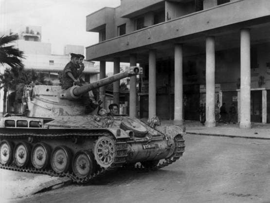 Suez War 1860123 Suez War by Unknown photographer, (20th century); (add.info.: During Suez crisis : french soldiers on a tank in Port Said (Egypt) 1956). Copyright: xBridgemanxImagesx 1860123