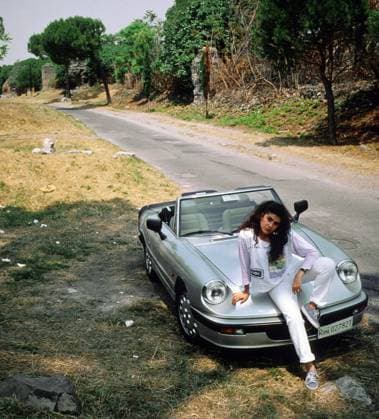 Cecilia Bartoli 2033624 Cecilia Bartoli by Unknown photographer, (20th century); (add.info.: Italian mezzo-soprano Cecilia Bartoli sitting on her Alpha Romeo Spider, Italy in 1990). Copyright: xBridgemanxImagesx 2033624