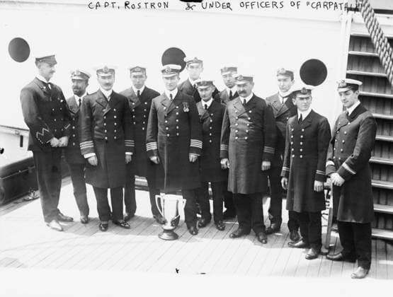 Captain Rostron and officers of the Carpathia, 1912 (b w photo) 3247870 Captain Rostron and officers of the Carpathia, 1912 (b w photo); Private Collection; (add.info.: RMS TITANIC struck an iceberg in April 1912 and sank, killing more than 1,500 people. Survivors were picked up by RMS Carpathia and taken to New York. The survivors awarded bronze medals to the crew members, officers silver and Captain Rostron a silver loving cup (next to him) and a gold medal in recognition of their heroism. James Gordon Partridge Bisset (1883-1967), Second Officer of the S.S. Carpathia stands fourth from the left. ). Copyright: xBridgemanxImagesx 3247870