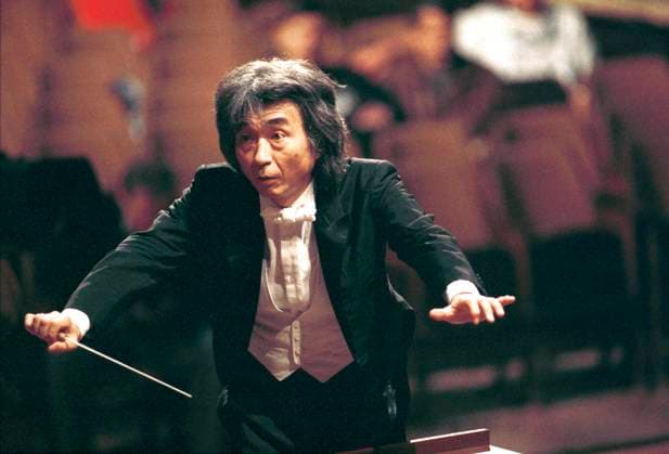 ***FILE PHOTO*** Japanese conductor Seiji Ozawa leads the Boston Symphony Orchestra at the Smetana Hall of the Municipal House in Prague, Czech Republic, on December 16, 1993. (CTKxPhoto JaroslavxHejzlar) CTKPhotoFO00022614  CTKPhotoFO00022614