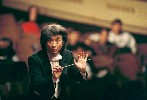 ***FILE PHOTO*** Japanese conductor Seiji Ozawa leads the Boston Symphony Orchestra at the Smetana Hall of the Municipal House in Prague, Czech Republic, on December 16, 1993. (CTKxPhoto JaroslavxHejzlar) CTKPhotoFO00022617  CTKPhotoFO00022617