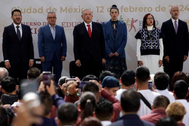 February 12, 2024, Mexico City, Mexico: The President of Mexico, Andres Manuel Lopez Obrador, the head of Government of Mexico City, Marti Batres and The Mexican Minister of Public Education, Leticia Ramirez, sing the Mexican national anthem during the inauguration of the Technological Baccalaureate of Education and Sports Promotion in the Tepito neighborhood. on February 12, 2024 in Mexico City, Mexico Mexico City Mexico - ZUMAe321 20240212_zia_e321_041 Copyright: xLuisxBarronx