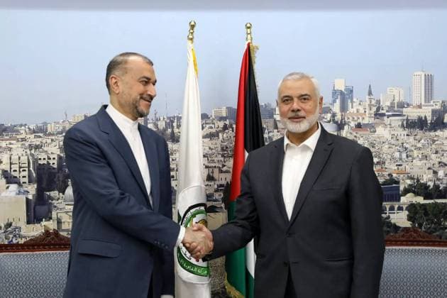 February 13, 2024, Doha, Qatar: Iranian Foreign Minister HOSSEIN AMIR ABDOLLAHIAN (L) meeting with Hamas political bureau chief ISMAIL HANIYEH (R) in Doha. Doha Qatar - ZUMAi98_ 20240213_zih_i98_002 Copyright: xIranianxForeignxMinistryx