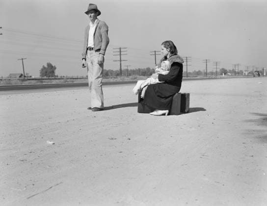 Young family, penniless, hitchhiking on U.S. Highway 99, California, 1936 (b w photo) 3738805 Young family, penniless, hitchhiking on U.S. Highway 99, California, 1936 (b w photo) by Lange, Dorothea (1895-1965); Private Collection; (add.info.: The father, twenty-four, and the mother, seventeen, came from Winston-Salem, North Carolina, early in 1935. Their baby was born in the Imperial Valley, California, where they were working as field laborers). Copyright: xBridgemanxImagesx 3738805