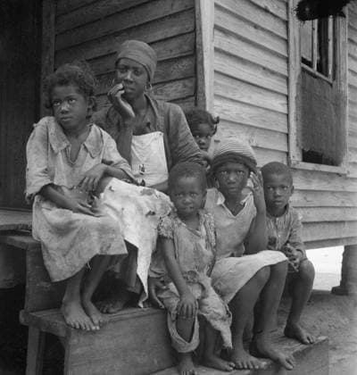Turpentine worker s family near Cordele, Alabama, 1936 (b w photo) 3738825 Turpentine worker s family near Cordele, Alabama, 1936 (b w photo) by Lange, Dorothea (1895-1965); Private Collection; (add.info.: Father s wages one dollar a day. This is the standard of living the turpentine trees support). Copyright: xBridgemanxImagesx 3738825