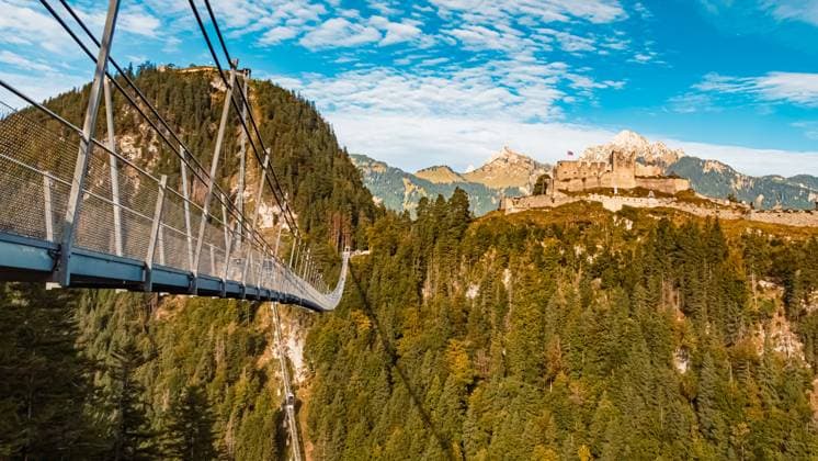 Alpine summer view at the famous Highline 179 suspension bridge and the Ehrenberg castle ruins near Reutte, Tyrol, Austria highline179 AX 052