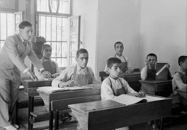 Blind school in Hebron, Palestine. Close up of small boy reading braille. Braille users can read computer screens and other electronic supports thanks to refreshable braille displays. Braille is named after its creator, Louis Braille, a Frenchman who lost his sight as a result of a childhood accident. In 1824, at the age of fifteen, he developed a code for the French alphabet as an improvement on night writing., Copyright: xUnitedxArchivesx xWorldxHistoryxArchivex WHA_119_0213 EDITORIAL USE ONLY !ACHTUNG AUFNAHMEDATUM GESCHÄTZT!