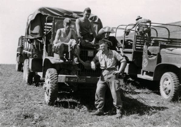 A group of 4 young French soldiers in Algeria between 1958 and 1962 (1960s) in front of military trucks (b w photo) PCT4294088 A group of 4 young French soldiers in Algeria between 1958 and 1962 (1960s) in front of military trucks (b w photo); (add.info.: A group of 4 young French soldiers in Algeria between 1958 and 1962 (1960s) in front of military trucks - photo from family archives, undated and uncredited - Algerian war, French army, colony, French colonies, Algerian desert, Jebel); Patrice Cartier. All rights reserved 2023. Copyright: x xPatricexCartier.xAllxrightsxreservedx2023x xBridgemanxImagesx 4294088