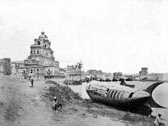 View of the Chattar Manzil Palace, on the River Gumti, Lucknow, during the Indian Rebellion, 1858 (b w photo) XJF466211 View of the Chattar Manzil Palace, on the River Gumti, Lucknow, during the Indian Rebellion, 1858 (b w photo) by Beato, Felice (Felix) (1825-c.1908); Private Collection; (add.info.: The royal boat of Nawab Sadaat Ali Khan can be seen on the riverbank; the palace was used as a field hospital during the rebellion; Indian Rebellion (1857-59); the fish shaped boat, ancient symbol of sovereignty;). Copyright: xBridgemanxImagesx 466211