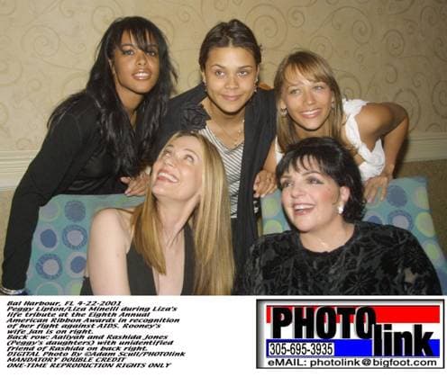 Bal Harbour, FL 4-22-2001.Peggy Lipton Liza Minelli Aaliyah during Lizas .life tribute at the Eighth Annual .American Ribbon Awards in recognition .of her fight against AIDS. Rooneys .wife Jan is on right..Back row: Aaliyah and Rashida Jones.(Peggys daughters) with unidentified.friend of Rashida on back right..DIGITAL Photo By Adam Scull PHOTOlink.. EDITORIAL USE ONLY Copyright: xx AdamxScullx phlphotos096337