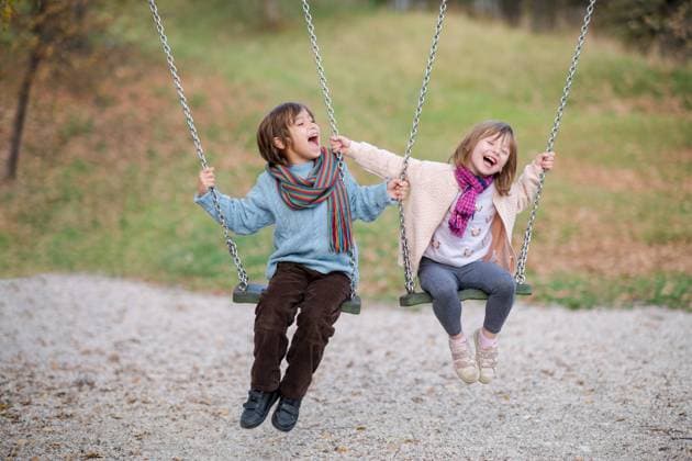 Creative Highlights Symbolbilder kids swing in the park cheerful children are having fun on a swing little brother and sister playing outside ,model released, Symbolfoto Copyright: xZoonar.com benisxarapovicx 13023637 ,model released, Symbolfoto ,property released
