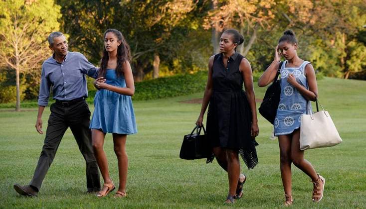 The First Family Returns to the White House United States President Barack Obama (L), daughters Sasha (2nd L), Malia (R) and wife Michelle arrive at the White House in Washington, D.C on August 23, 2015 upon their return from vacationing at Martha s Vineyard. Credit: Olivier Douliery Pool via CNP Washington District of Columbia United States of America EDITORIAL USE ONLY Copyright: xx _DOU6926 OlivierxDoulieryx cnpphotos054653