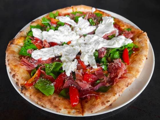 Wood-fired oven pizza with parma ham and burrata cheese Wood-fired oven pizza ready to eat horizontal close-up shot ,model released, Symbolfoto Copyright: xZoonar.com TonixRantalax 12967949 ,model released, Symbolfoto ,property released