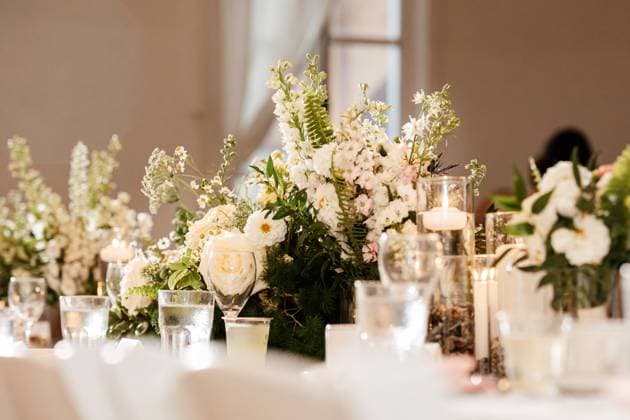 White wedding reception decor with elegant candles Winnipeg, Manitoba, Canada CR_MFBW240214-1352122-01