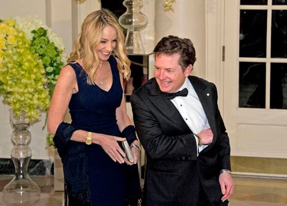 Actor Michael J. Fox, right, and Tracy Pollan, left, arrive for the State Dinner in honor of Prime Minister Trudeau and Mrs. Sophie GrÃgoire Trudeau of Canada at the White House in Washington, DC on Thursday, March 10, 2016. Credit: Ron Sachs Pool via CNP EDITORIAL USE ONLY Copyright: xx x cnpphotos058323