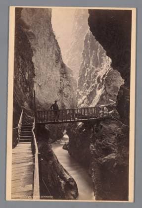 RECORD DATE NOT STATED View of the Gorges du Trient at Vernayaz in Switzerland with a man on a bridge, Francis Frith, c. 1880 - c. 1920 photograph. cabinet photograph Switzerland photographic support. cardboard albumen print dale, valley Switzerland Copyright: xpiemagsx rknbpie11012024-36456 !ACHTUNG AUFNAHMEDATUM GESCHÄTZT!