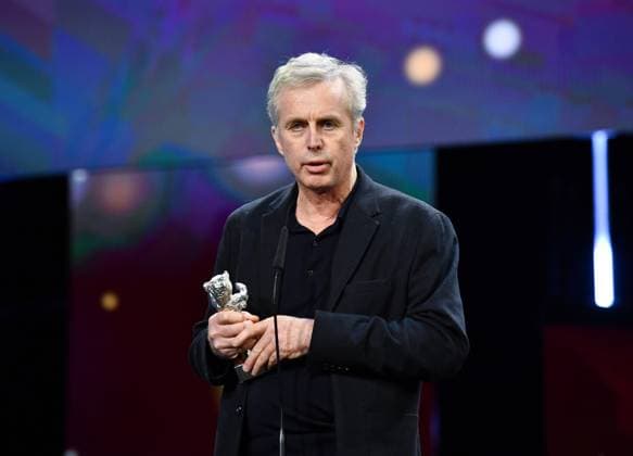 (240225) -- BERLIN, Feb. 25, 2024 -- Director Bruno Dumont speaks after receiving the Silver Bear Jury Prize during the 74th Berlin International Film Festival in Berlin, Germany, Feb. 24, 2024. ) GERMANY-BERLIN-INTERNATIONAL FILM FESTIVAL RenxPengfei 