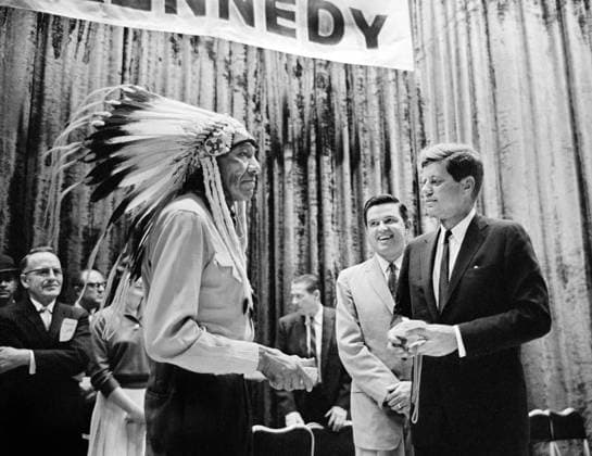 Lasalle Pocatello, grandson of Tondzaosha, Chief Pocatello, giving gift to Senator John F. Kennedy while on stage rally during Kennedy s presidential campaign, Pocatello High School, Pocatello, Idaho, USA, Thomas J. O Halloran, U.S. News & World Report Magazine Photograph Collection, September 7, 1960 Lasalle Pocatello, grandson of Tondzaosha, Chief Pocatello, giving gift to Senator John F. Kennedy while on stage rally during Kennedy s presidential campaign, Pocatello High School, Pocatello, Idaho, USA, Thomas J. O Halloran, U.S. News & World Report Magazine Photograph Collection, September 7, 1960. Copyright: 1010_05_ghi-circa12253