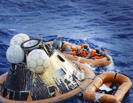 American Astronauts Edwin E. Aldrin, Neil A. Armstrong and Michael Collins in decontamination raft during recovery operation of Command Module Columbia after successful Apollo 11 mission, the first manned lunar mission, Pacific Ocean, NASA, July 24, 1969 American Astronauts Edwin E. Aldrin, Neil A. Armstrong and Michael Collins in decontamination raft during recovery operation of Command Module Columbia after successful Apollo 11 mission, the first manned lunar mission, Pacific Ocean, NASA, July 24, 1969. Copyright: 1010_05_ghi-circa12384