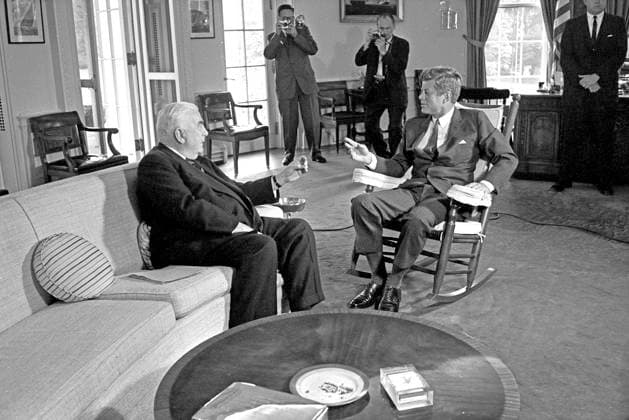 Kennedy Meets Menzies United States President John F. Kennedy (in rocking chair), right, meets with Prime Minister of Australia Robert G. Menzies, left, in the Oval Office of the White House in Washington, DC on September 25, 1962. Credit: Arnie Sachs CNP Washington District of Columbia United States of America EDITORIAL USE ONLY Copyright: xx ArniexSachsx cnpphotos066032