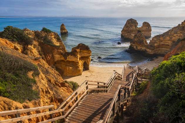 Portugal, Algarve, Lagos, Steps leading to Praia do Camilo beach, ABOF00949