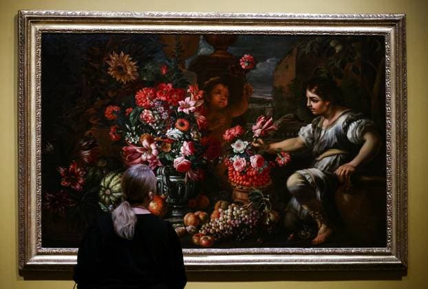 Entertainment Themen der Woche KW10 Entertainment Bilder des Tages RUSSIA, MOSCOW - MARCH 4, 2024: A visitor views Still Life of Fruits, Flowers, Boy Figure and Putto by Abraham Brueghel during a press preview of the exhibition titled Flowers, Fruits, Musical Instruments in Italian Baroque Painting at Moscowâ€™s Pushkin State Museum of Fine Arts. Artyom Geodakyan TASS  67903408
