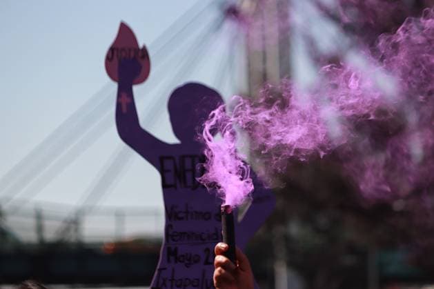 March 8, 2024 in Mexico City, Mexico: A woman holds a purple sparklerwhile take part during the closing Zaragoza Avenue within the framework of International Women s Day. on March 8, 2024. in Mexico City, Mexico. Mexico City Mexico - ZUMAe321 20240308_zia_e321_012 Copyright: xCarlosxSantiagox