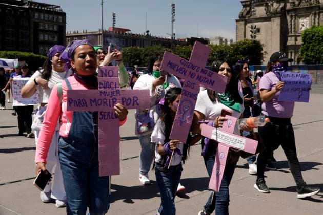 March 8, 2024, Mexico City, Mexico: Women hold crosses while take part during International Women s Day demonstration to protest agains femicides. hundreds of women join protests around the world to commemorate International Women Day. on March 8, 2024 in Mexico City, Mexico Mexico City Mexico - ZUMAe321 20240308_zia_e321_044 Copyright: xLuisxBarronx