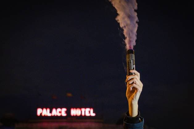 March 8, 2024, Madrid, Spain: A woman raises a flare with the Madrid Hotel Palace behind during the International Women s Day demonstration. Hundreds of women have demonstrated in the streets of central Madrid to celebrate International Women s Day for another year. Madrid Spain - ZUMAs197 20240308_aaa_s197_576 Copyright: xDavidxCanalesx