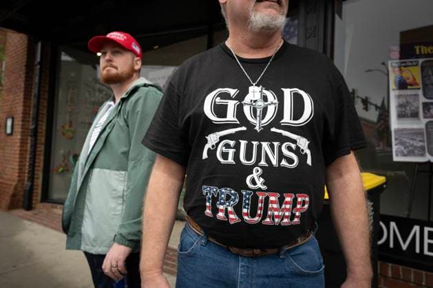 March 9, 2024, Rome, Georgia, USA: Two Trump supporters who are vocal advocates for gun rights watch the crowds gather near the rally. Thousands of Georgia residents converge on Rome, Georgia in the largely conservative northwest corner of the state for a rally to support former President Donald Trump in his reelection bid. Rome USA - ZUMAn03_ 20240309_zaf_n03_023 Copyright: xRobinxRaynex