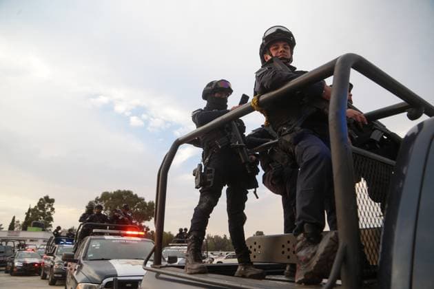March 15, 2024, Ecatepec de Morelos, Mexico: A member of the State Police during the departure of a security operation called Rastrillo to combat crime in the Municipality of Ecatepec. More than 1,300 elements from the Attorney General s Office of the Republic (FGR), the Attorney General s Office of the State of Mexico (FGJEM) and the State Police take part during the Operation. on March 15, 2024 in Ecatepec de Morelos, Mexico. Ecatepec De Morelos Mexico - ZUMAe321 20240315_zia_e321_034 Copyright: xRickxCruzx