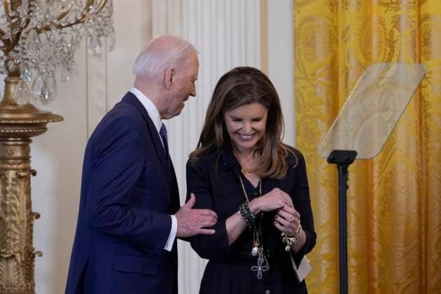 President Joe Biden hosts a Women™s History Month reception United States President Joe Biden touches Maria Shriver, Women™s Health Advocate before speaking at a Women™s History Month reception at the White House in Washington, DC, March 18, 2024. Credit: Chris Kleponis CNP AdMedia Washington District of Columbia United States of America EDITORIAL USE ONLY  Copyright: xx _CKE6065 CNP AdMediax admphotostwo883343
