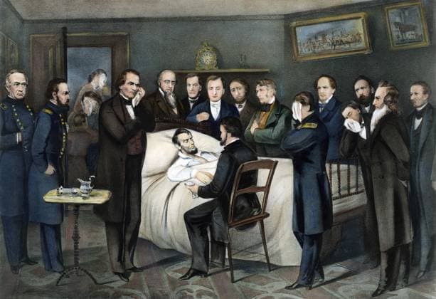 DEATH OF LINCOLN, 1865. The deathbed of President Abraham Lincoln, Washington, D.C., 15 April 1865. Lithograph by Currier & Ives, 1865.  Copyright: xSarinxImagesx xGRANGERx 0009003