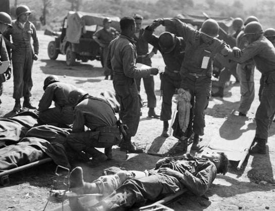 KOREAN WAR: TRIANGLE HILL. Wounded American soldiers of the Seventh Infantry Division at the aid station during the struggle for Triangle Hill, October 1952.  Copyright: xGRANGERx xGRANGERx 0018239