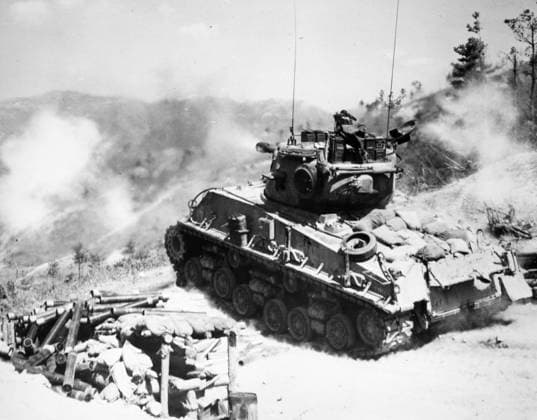 KOREAN WAR: INFANTRY, 1952. An American Second Infantry Division tank firing at Communist positions in Korea, July 1952.  Copyright: xGRANGERx xGRANGERx 0044093
