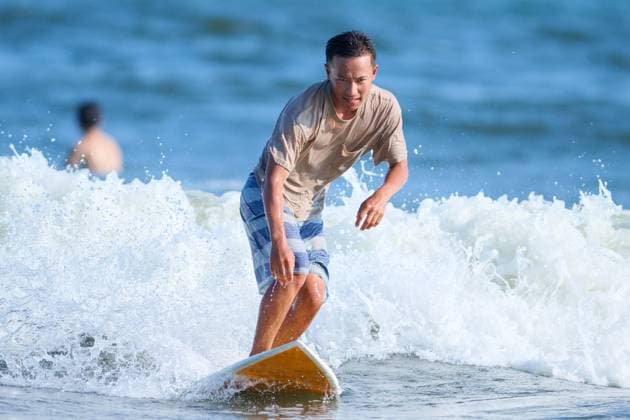 A man riding a wave on a surfboard AFLO235705686  , 235705686.jpg, ,model released, Symbolfoto