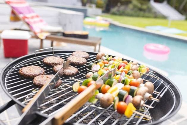 Burgers and vegetable skewers are grilling by a poolside Burgers and vegetable skewers are grilling by a poolside. Lounge chairs and a pink float suggest a relaxed outdoor barbecue setting., model released, , property released, Cape Town, South Africa, 15.11.2023, 4951672.jpg, burgers,vegetable skewers,grilling,poolside,lounge chairs,pink float,outdoor barbecue,relaxed setting,summer,food,cooking,delicious,meal,lunch,dinner,barbecue party,outdoor,pool,relaxation,leisure,fun,friends,family,gathering,tasty,skewers,meat,vegetables,cookout,grill,sunny,day,entertainment,outdoor cooking,fresh,BBQ,hamburgers,kebabs,snacks,party,socializing,summer joy,vacation,picnic