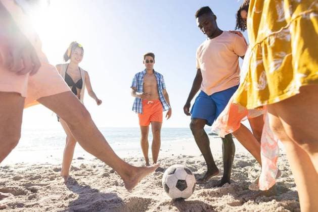 Diverse friends enjoy a game of soccer on the beach Diverse friends enjoy a game of soccer on the beach. The outdoor setting captures the essence of summer fun and teamwork., model released, , property released, Cape Town, South Africa, 2024-01-23T22:00:00.000Z, 5113114.jpg, people,diverse,friends,game,soccer,beach,outdoor,setting,captures,essence,summer,fun,teamwork,sports,activity,leisure,recreation,diverse group,beach game,sunny,enjoying,competition,playing,outdoors,bonding,diversity,beach soccer,beach fun,sunny day,sports activity,outdoor recreation,leisure time,teamwork game,diverse group activity Young Adult,Man,Male,Black,Woman,Female,Multiracial,White