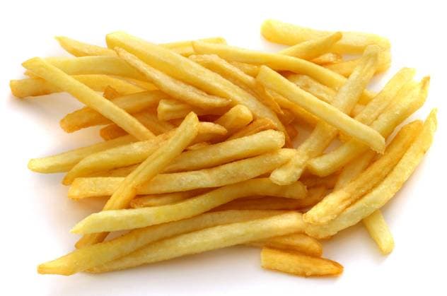Tasty slices of french fries on white background Copyright: xTATIANAxKORCHEMKINAx xDesignxPicsx , 32,358,164 Copyright: TATIANAxKORCHEMKINAx xDesignxPics 32358164 !ACHTUNG AUFNAHMEDATUM GESCHÄTZT! RECORD DATE NOT STATED