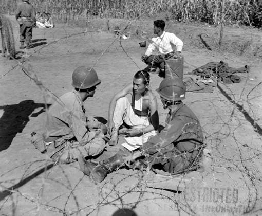 RECORD DATE NOT STATED Korea: During the Korean War (1950-1953) an interrogation team of the US 7th Infantry Division question a POW, Anvang-Ni, 20 September, 1950. The Korean War (25 June 1950 - armistice signed 27 July 1953) was a military conflict between the Republic of Korea, supported by the United Nations, and North Korea, supported by the People s Republic of China (PRC), with military material aid from the Soviet Union. The war was a result of the physical division of Korea by an agreement of the victorious Allies at the conclusion of the Pacific War at the end of World War II.<br ><br > The Korean peninsula was ruled by Japan from 1910 until the end of World War II. Following the surrender of Japan in 1945, American administrators divided the peninsula Copyright: xxPicturesxFromxHistoryx