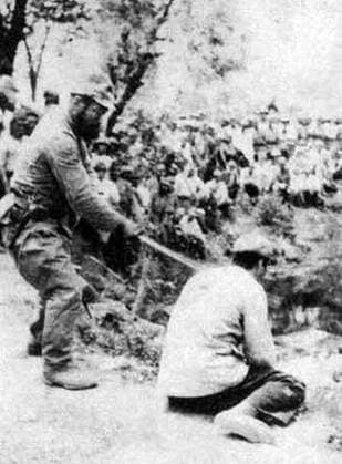 China: Rape of Nanking - Japanese soldier beheading Chinese victim. The Nanking Massacre or Nanjing Massacre, also known as the Rape of Nanking, is a mass murder and war rape that occurred during the six-week period following the Japanese capture of the city of Nanjing (Nanking), the former capital of the Republic of China, on December 13, 1937 during the Second Sino-Japanese War. During this period, hundreds of thousands of Chinese civilians and disarmed soldiers were murdered and 20,000 80,000 women were raped by soldiers of the Imperial Japanese Army. Copyright: xxPicturesxFromxHistoryx