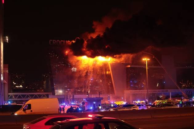 March 22, 2024. Russia, Moscow Region, Krasnogorsk. Smoke rises over the Crocus City Hall in the town of Krasnogorsk where unidentified persons opened fire. Evacuation is underway. DmitryxGolubovich